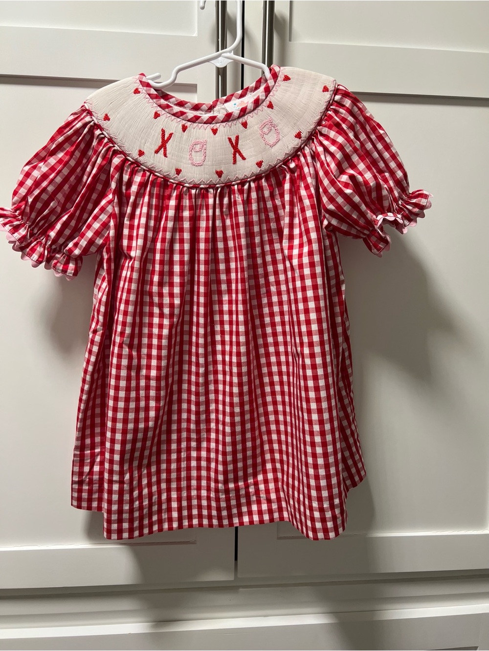 Stitchy Fish gingham dress with smocked bodice featuring embroidery XOXO